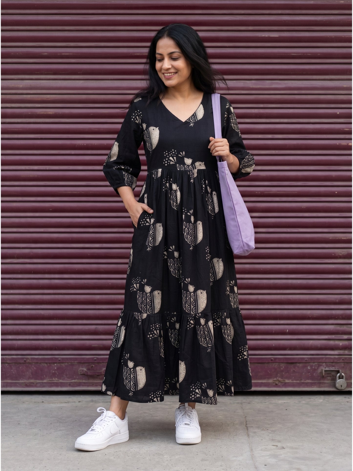 Darzaania black Pure Cotton Maxi Dress in black with an elegant bird-inspired print and a flowing maxi silhouette.