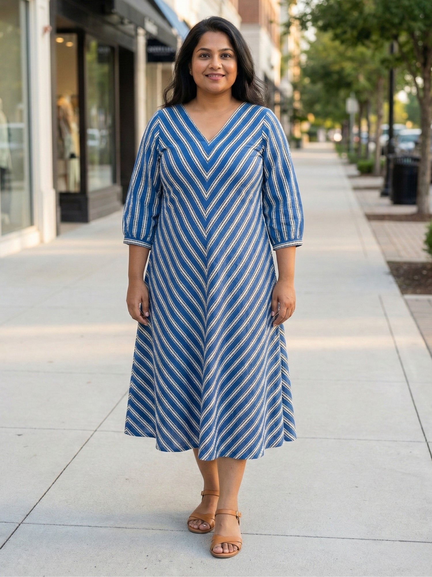 Blue striped dress for women, front view, handcrafted cotton dress with relaxed fit and pockets
