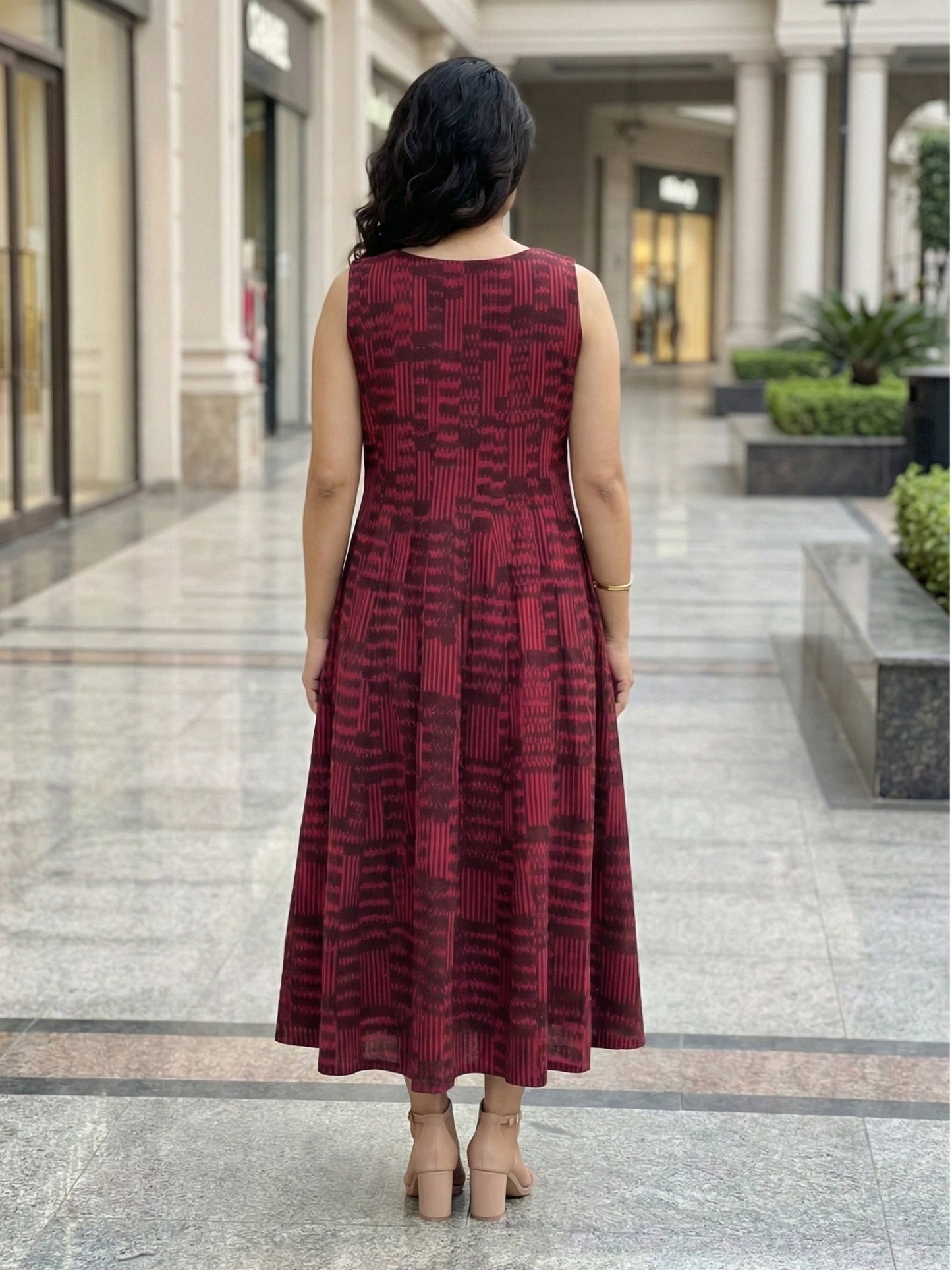 Women wearing wine ikat kali dress with pockets