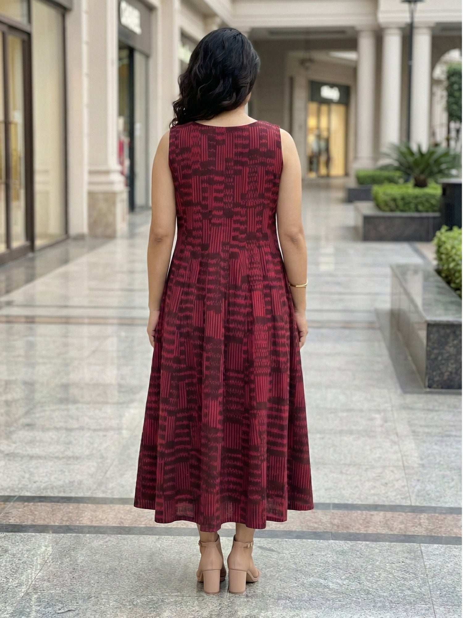 Women wearing wine ikat kali dress with pockets