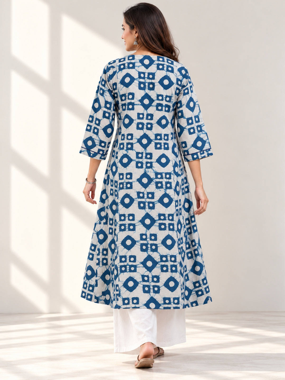 Darzaania Bagru cotton kurta set with white palazzo pants – back view