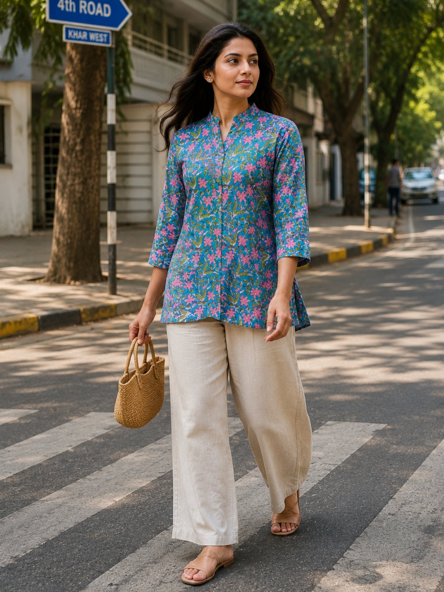 Aster Blue Cotton Top for women in pure cotton featuring pink floral motifs and a comfortable relaxed fit.