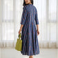Mehr striped cotton dress in navy blue with delicate red floral motifs, relaxed fit and elegant shoulder-to-hem panels.
