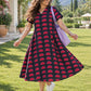 Half Moon Print Black Midi A line dress by Darzaania