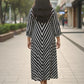 Black striped dress for women, back view, clean silhouette with vertical stripes and comfortable fall