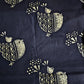 Black block print cotton fabric close-up