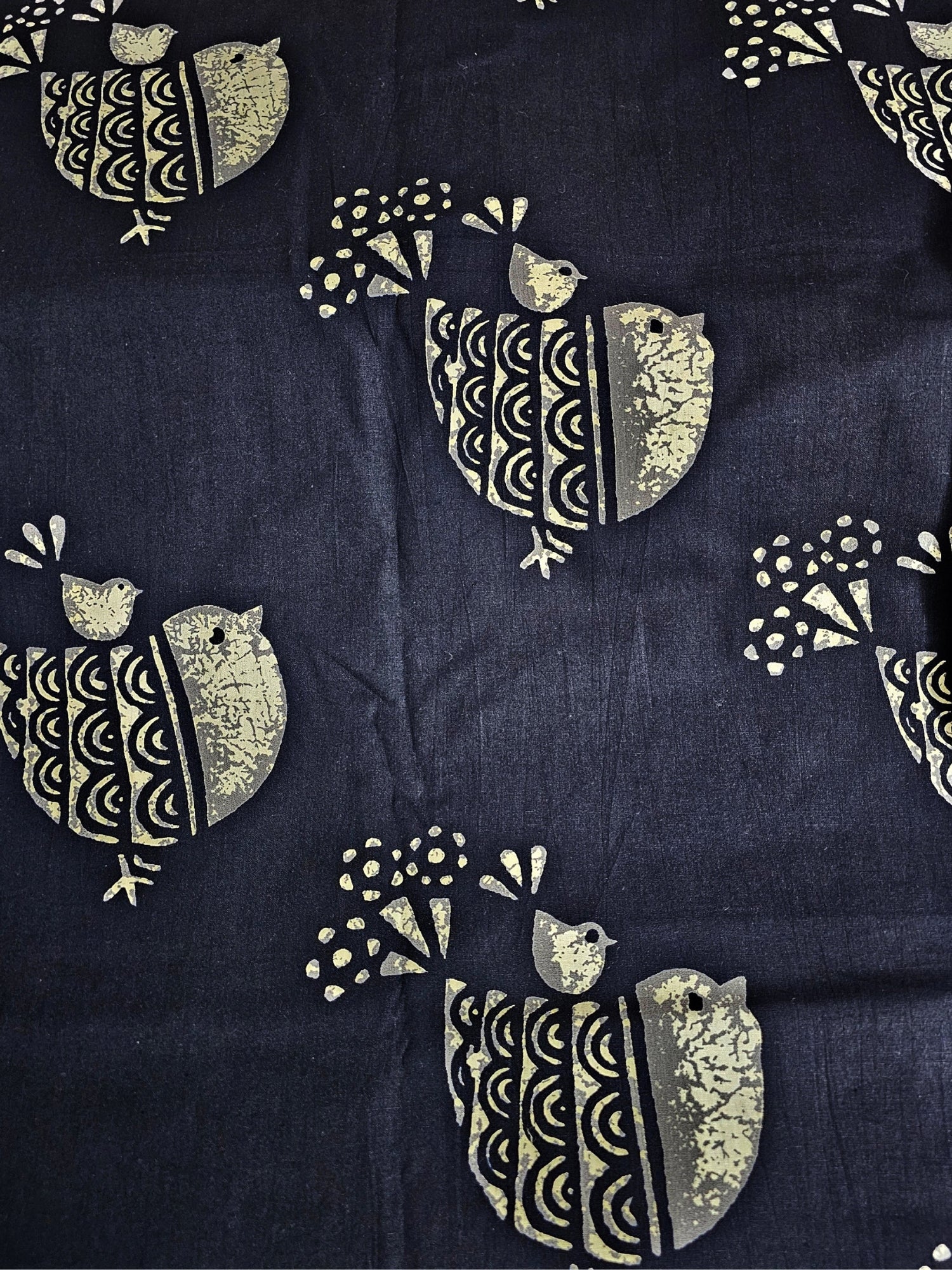 Black block print cotton fabric close-up