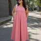 Front view of Urban Peach Flow Dress in handloom ikat cotton on model, full length maxi dress with pockets.