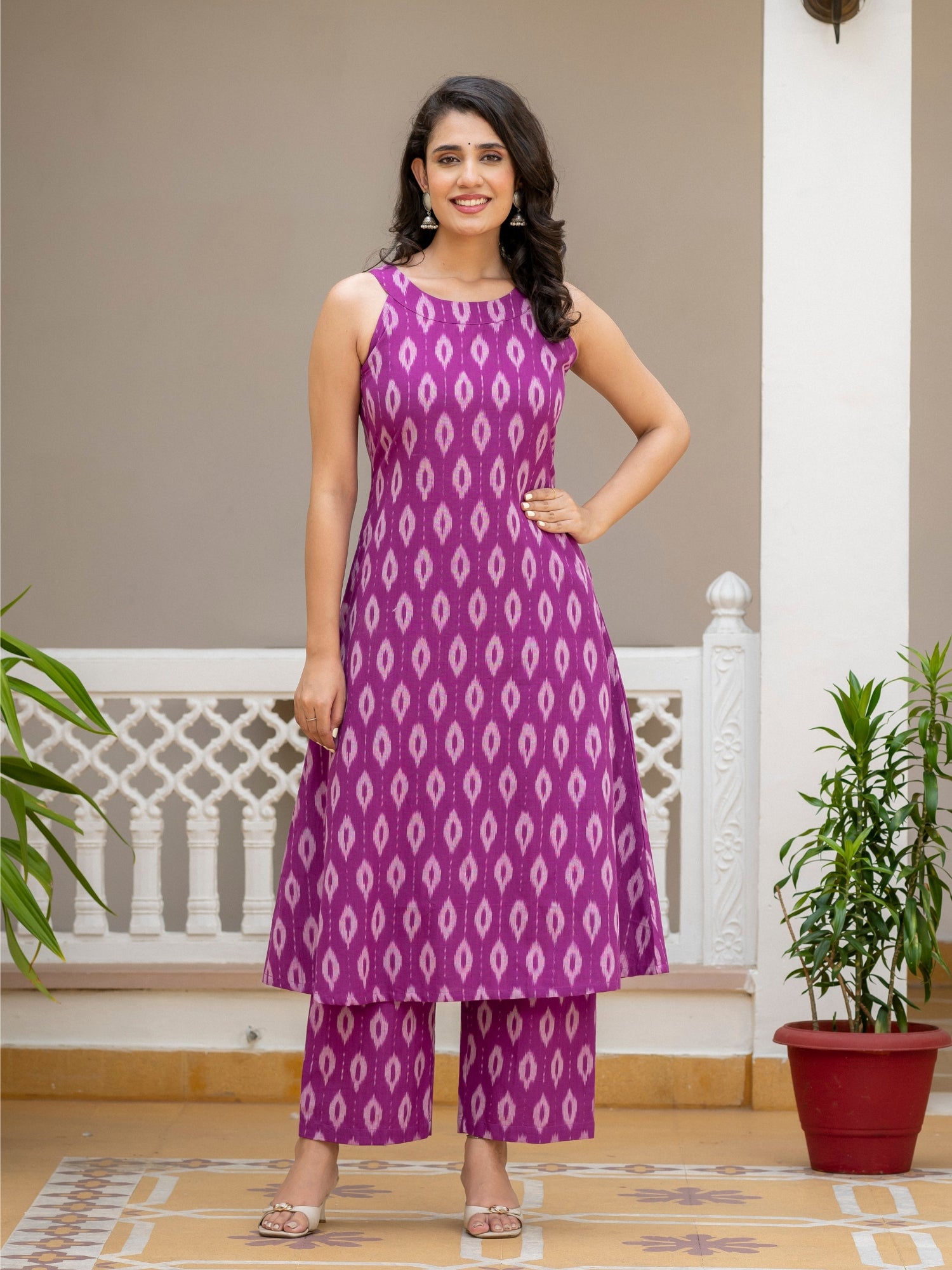 Pure handloom Ikat cotton fabric detail in pink and purple weave