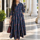 Darzaania Mehr Navy Blue Cotton Kalidaar Dress featuring delicate red floral motifs, vertical stripes and a flowing silhouette
