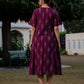 Back view of wine Ikkat midi dress made in pure cotton