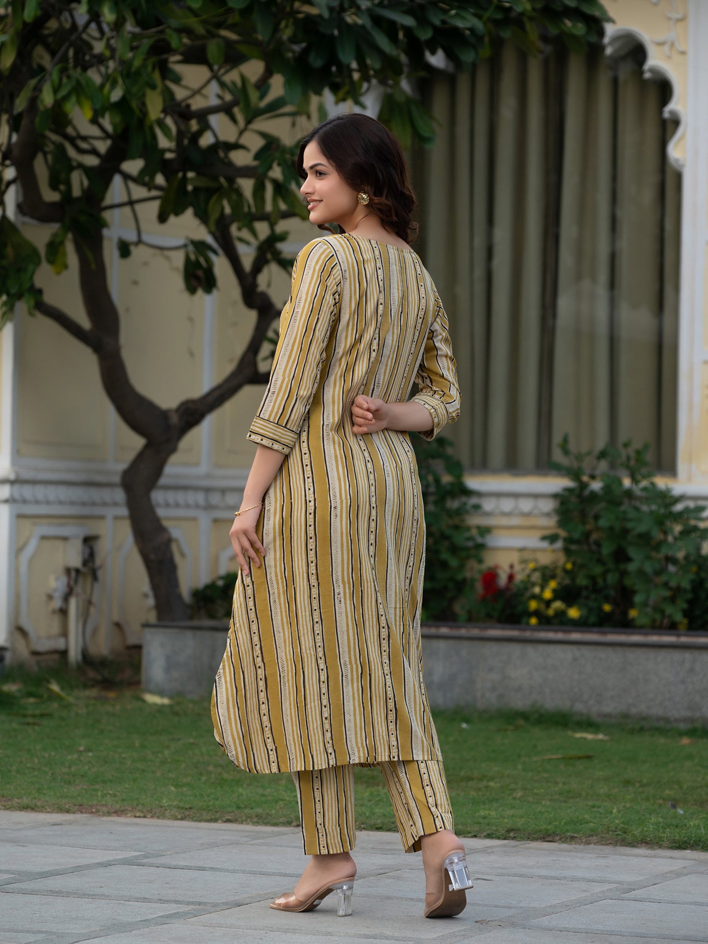 Side profile of mustard Ajrakh cotton co-ord set with soft structure and breathable fabric