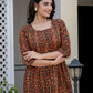 Woman styling Darzaania Nayra printed cotton kurta set in natural light