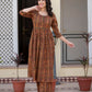 Woman wearing Darzaania Nayra brown printed cotton kurta set front view