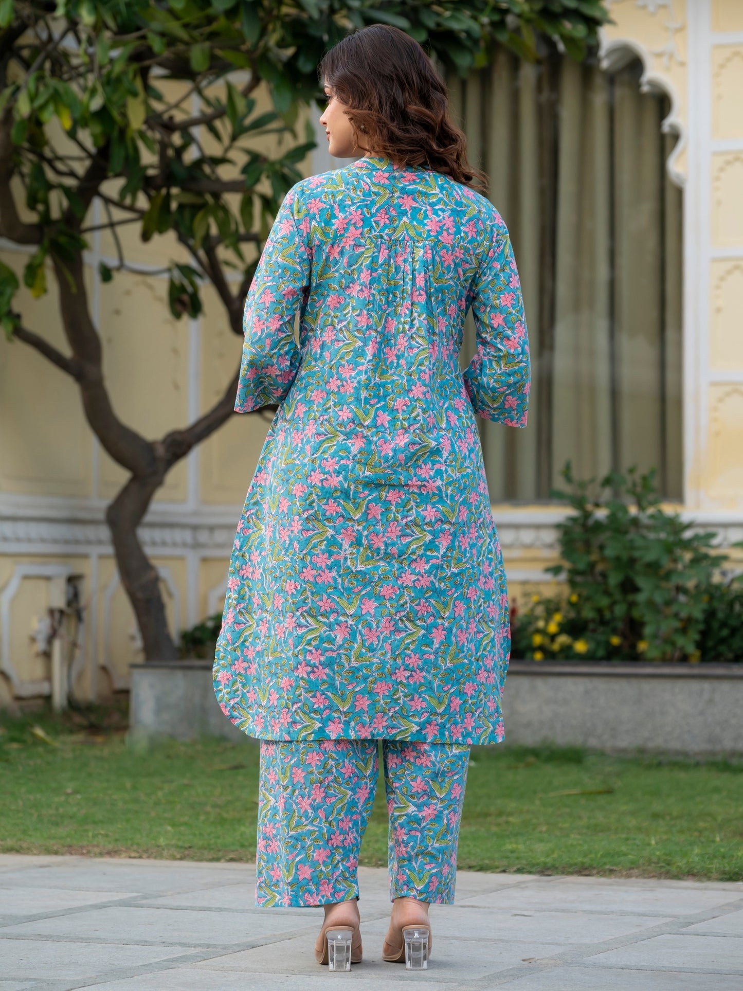 Back view of sky blue hand block printed kurta co ord set with pink flowers
